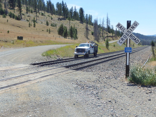 GDMBR: The Inspector backed down the railroad in his truck.
